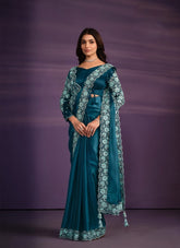 Ornate Looking Satin Silk Partywear Saree in Light Blue Colour